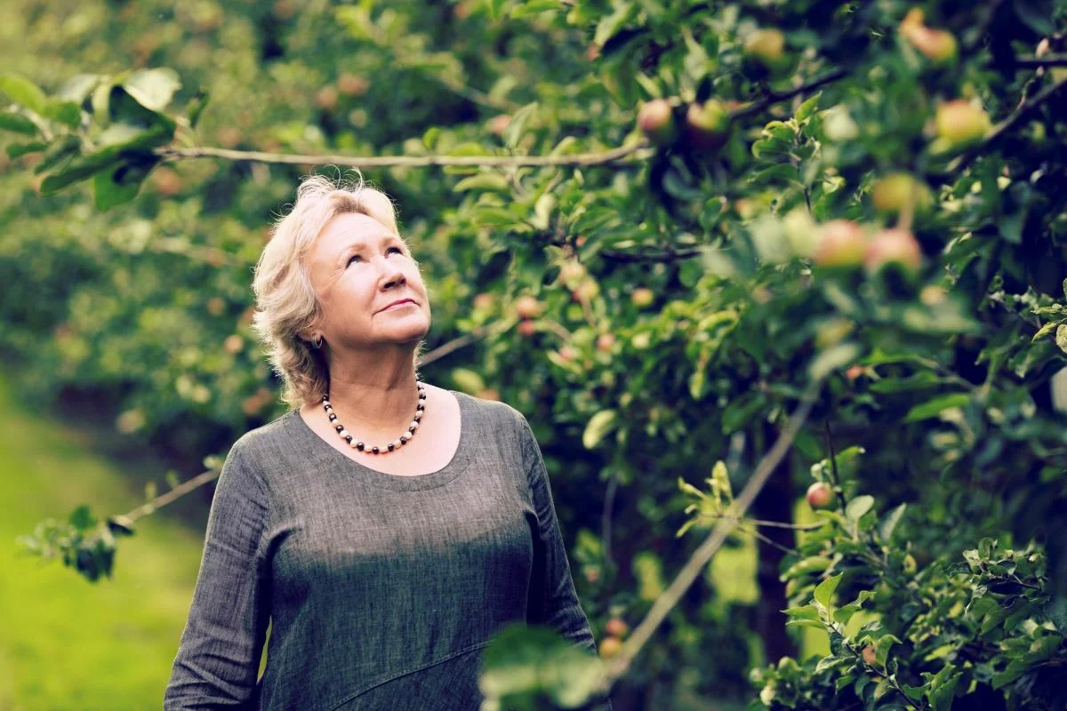 Woman in an apple orchard