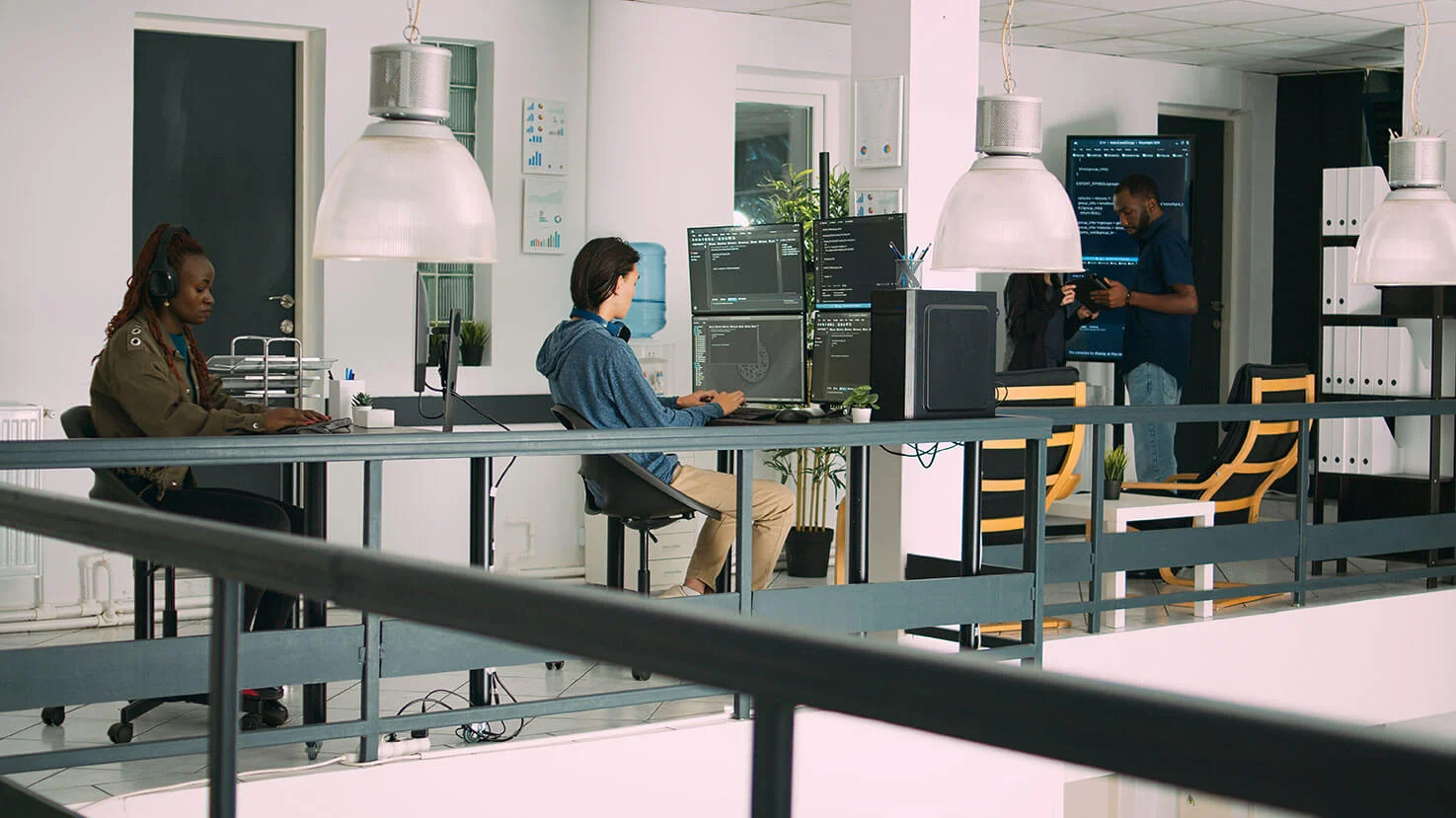 Senior developers coding in their studio